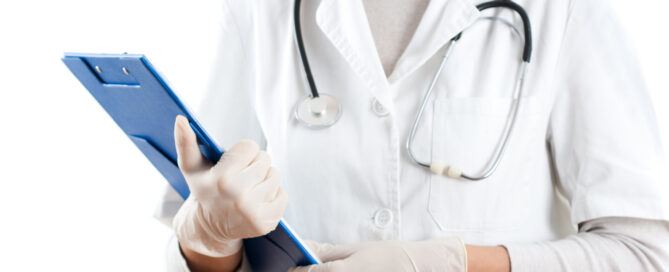 Medical professional holding a clipboard